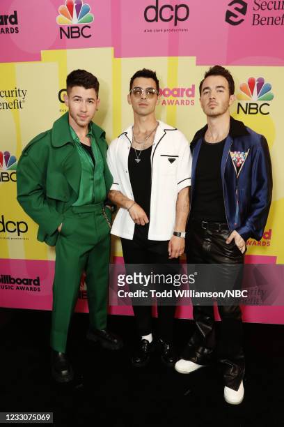 Pictured: Nick Jonas, Joe Jonas, and Kevin Jonas of Jonas Brothers arrive to the 2021 Billboard Music Awards held at the Microsoft Theater on May 23,...