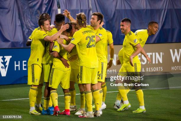 Randall Leal of Nashville SC celebrates his goal with teammates during the first half against the Austin FC at Nissan Stadium on May 23, 2021 in...