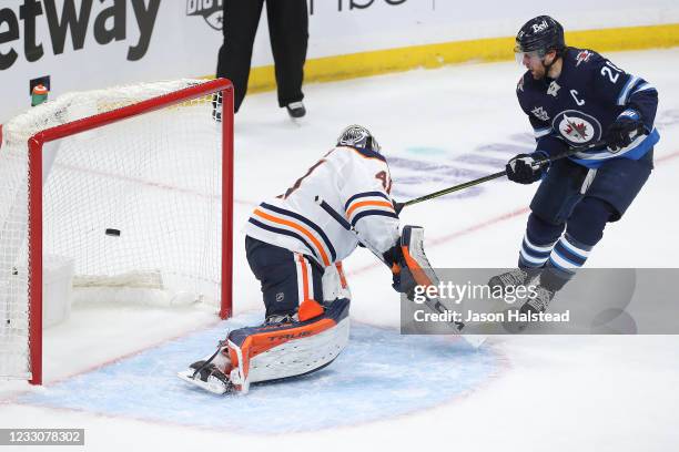 Blake Wheeler of the Winnipeg Jets beats Mike Smith of the Edmonton Oilers for a goal in Game Three of the First Round of the 2021 Stanley Cup...