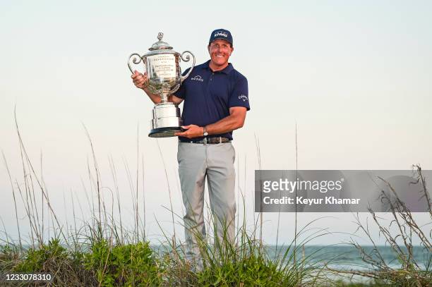 Phil Mickelson smiles with the Wanamaker Trophy after his two stroke victory in the final round of the PGA Championship on The Ocean Course at Kiawah...
