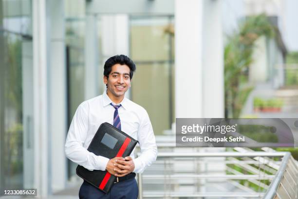indian young businessman - stock images - expertise stock pictures, royalty-free photos & images