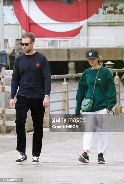 Jennifer Lawrence is seen out for a walk by the Hudson river with her husband Cooke Maroney on May 24, 2021 in New York City, New York.