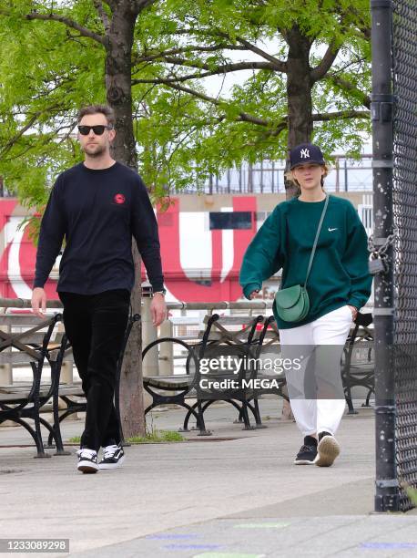 Jennifer Lawrence is seen out for a walk by the Hudson river with her husband Cooke Maroney on May 24, 2021 in New York City, New York.