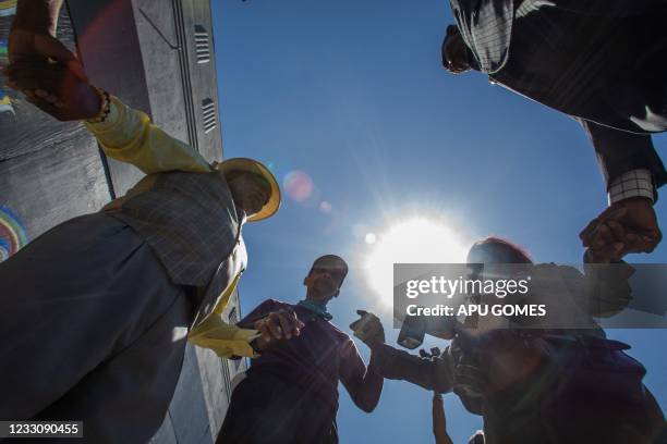 Black leaders gather at the Black LivesMatter mural on May 24, 2021 in Los Angeles, California tocall on Mayor Eric Garcetti and the City Council to...