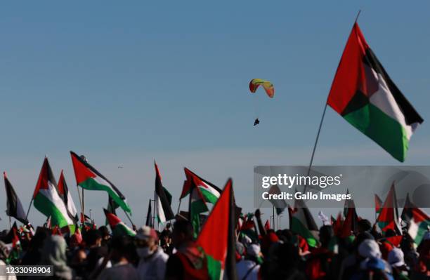 Paraglider seen as South Africans take part in a Palestine solidarity picket at the Sea Point promenade on May 23, 2021 in Cape Town, South Africa....