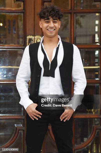 Karim Zeroual poses at a photocall for "Here Come The Boys" at The London Palladium on May 25, 2021 in London, England.