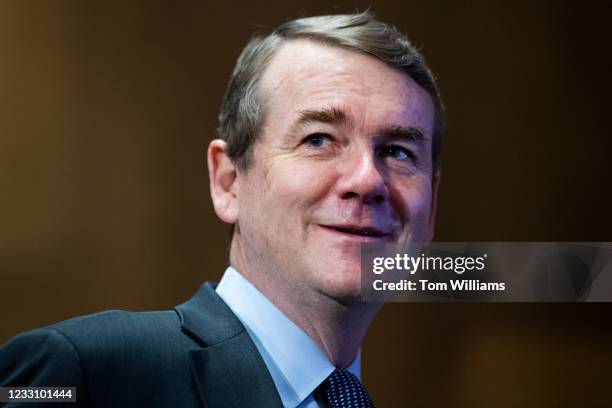 Sen. Michael Bennet, D-Colo., prepares to introduce Jonathan Davidson, nominee to be deputy under secretary of the Treasury, during his Senate...