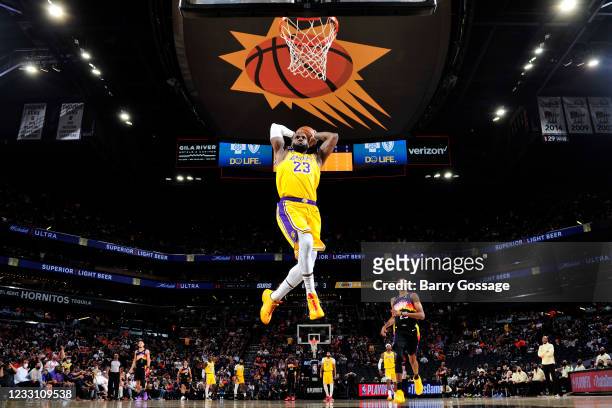 LeBron James of the Los Angeles Lakers dunks the ball during the game against the Phoenix Suns during Round 1, Game 2 of the 2021 NBA Playoffs on May...