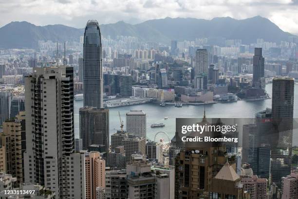 The Two International Finance Center, left, and other buildings in Hong Kong, China, on Wednesday, May 2021. Hong Kong's unemployment rate fell for a...