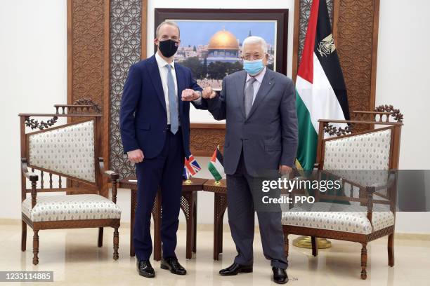 In this handout image provided by the Palestinian Press Office, Foreign Secretary Dominic Raab meets Palestinian President Mahmoud Abbas, on May 26,...