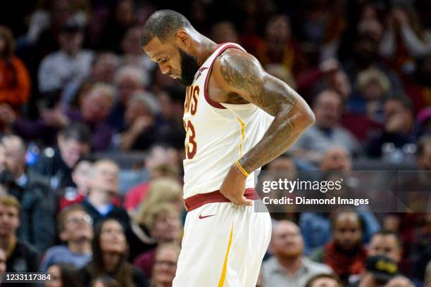 LeBron James of the Cleveland Cavaliers walks down the court in the first half of a game against the Memphis Grizzlies at Quicken Loans Arena on...
