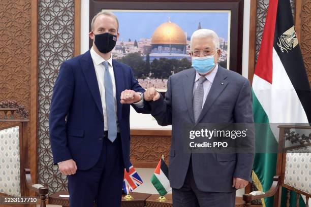 In this handout image provided by the Palestinian Press Office, Foreign Secretary Dominic Raab meets Palestinian President Mahmoud Abbas, on May 26,...