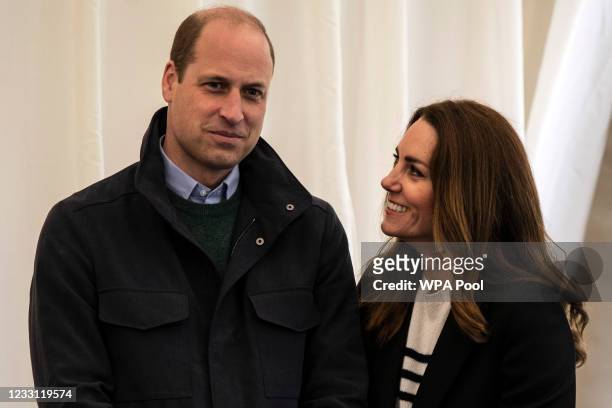 Prince William, Duke of Cambridge and Catherine, Duchess of Cambridge meet students during a visit to the University of St Andrews on May 26, 2021 in...