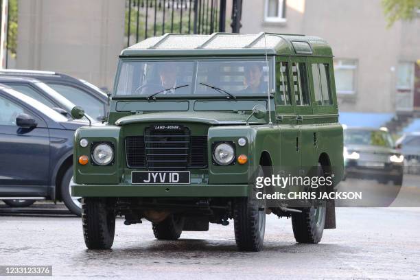 Britain's Prince William, Duke of Cambridge and Britain's Catherine, Duchess of Cambridge arrive in a Land Rover Defender that previously belonged to...