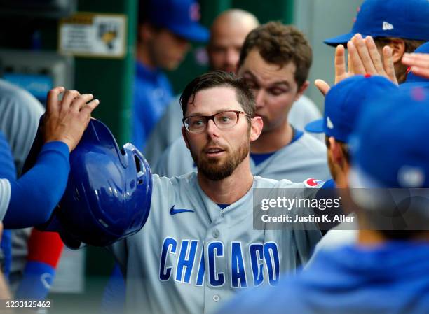 Eric Sogard of the Chicago Cubs celebrates after scoring on an RBI single in the second inning against the Pittsburgh Pirates at PNC Park on May 26,...