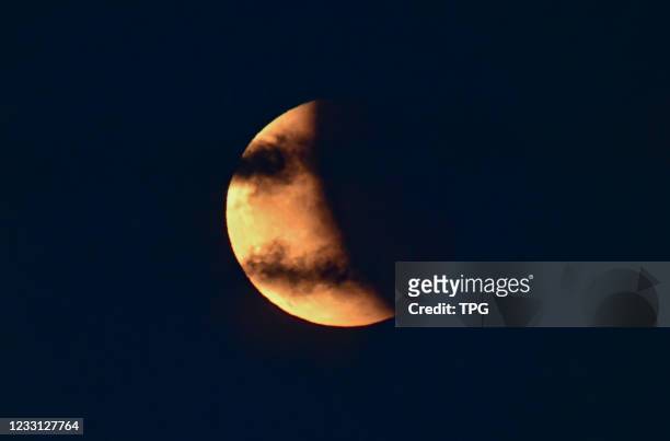 The rare red supermoon and total lunar eclipse show together in the sky on 26th May, 2021 in Hohhot,Inner Mongolia,China
