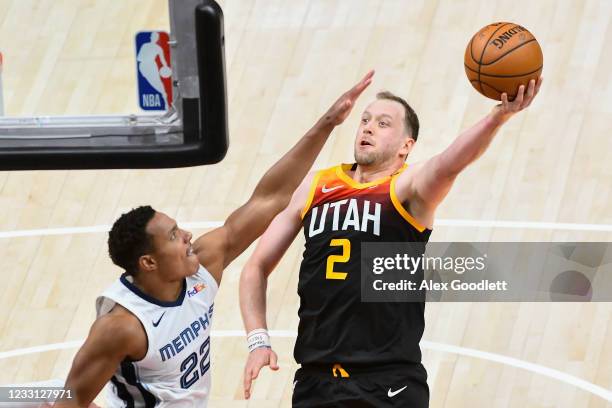 Joe Ingles of the Utah Jazz shoots over Desmond Bane of the Memphis Grizzlies in Game Two of the Western Conference first-round playoff series at...