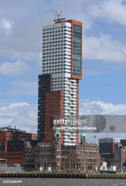 May 2021, Netherlands, Rotterdam: The former main building of the shipping company Holland Amerika Lijn at the foot of the 140-metre-high high-rise...