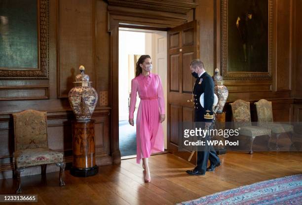 Catherine, Duchess of Cambridge arrives to meet with Mila Sneddon, aged five, and her family, at the Palace of Holyroodhouse on May 27, 2021 in...