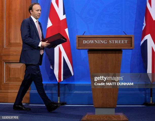 Britain's Health Secretary Matt Hancock arrives to give an update on the coronavirus Covid-19 pandemic during a virtual press conference inside the...