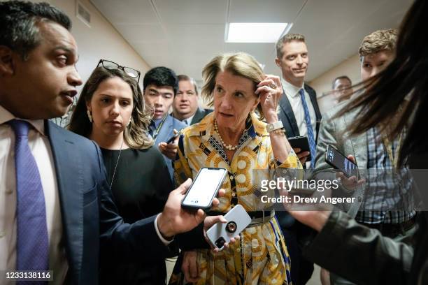 Sen. Shelley Moore Capito speaks with reporters on her way to a vote at the U.S. Capitol on May 27, 2021 in Washington, DC. The mother of late...