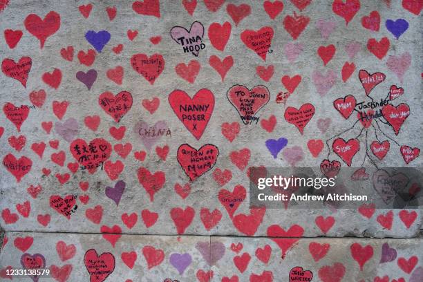 The National Covid memorial wall, a sea of red love hearts remembering all those who have died due to the COVID-19 pandemic on the 25th of May 2021...