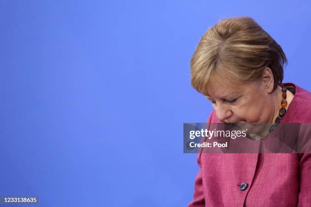 German Chancellor Angela Merkel attends a press conference after talks on the country s coronavirus strategy as the pandemic continues, in the German...