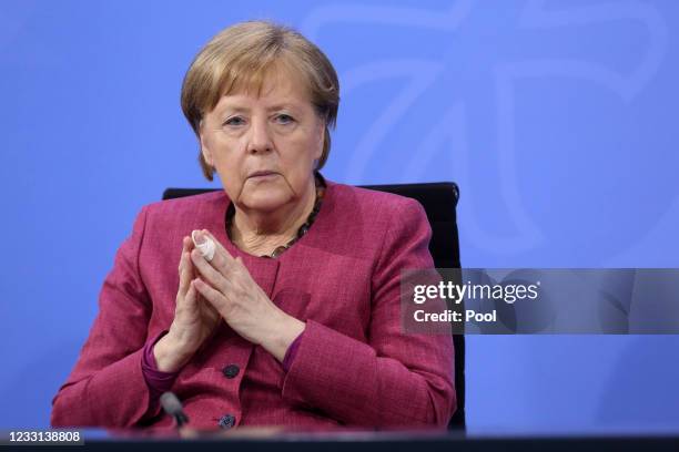 German Chancellor Angela Merkel attends a press conference after talks on the country s coronavirus strategy as the pandemic continues, in the German...