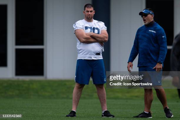 Indianapolis Colts tackle Eric Fisher watches the Indianapolis Colts offseason practice on May 27, 2021 at the Indiana Farm Bureau Football Center in...