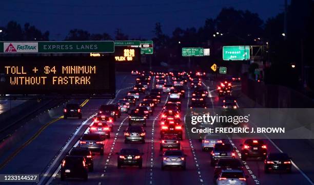 Vehicles head east out of Los Angeles on the Interstate 10 freeway in Alhambra, California on May 27 ahead of the Memorial Day weekend. - Millions of...