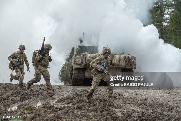 Picture taken on May 27, 2021 shows soldiers taking part in a large-scale exercise titled Spring Storm led by Estonia, with the participation of NATO...