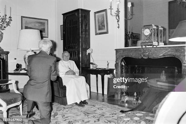 Pope John Paul II is photographed by French photographer Jacques Henri Lartigue at the Elysee Palace in Paris during his official visit in France on...