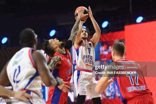 Moscow's Italian-US guard Daniel Hackett and Anadolu Efes Istanbul's US-Turkish point guard Shane Larkin vie for the ball during the Basketball...