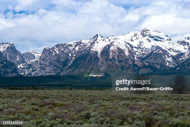 An American Airlines Airbus A319 arrives at the Jackson Hole Airport near Grand Teton National Park on May 28, 2021 in Jackson Hole, Wyoming.