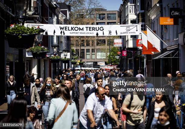 Shoppers walk in a pedestrian street in the centre of Utrecht, on May 29, 2021. - Netherlands OUT / Netherlands OUT