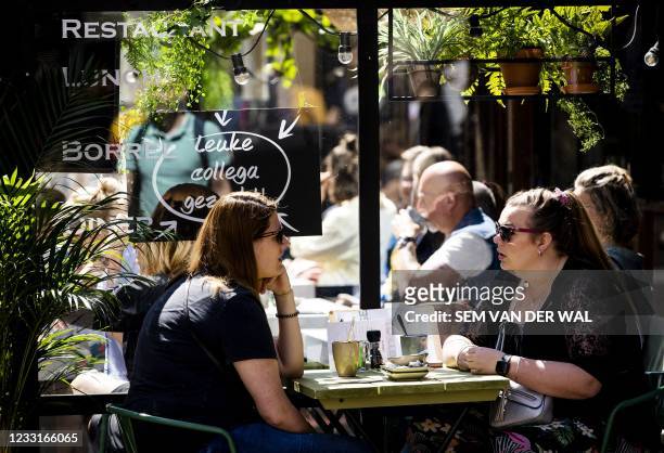 Visitors sit on a terrace in the centre of Utrecht, on May 29, 2021. - Netherlands OUT / Netherlands OUT
