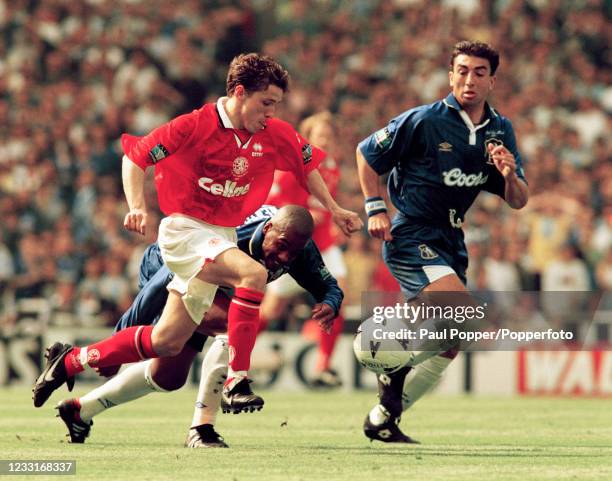 Juninho of Middlesbrough moves away from Eddie Newton and Roberto Di Matteo of Chelsea during the FA Cup Final at Wembley Stadium on May 17, 1997 in...