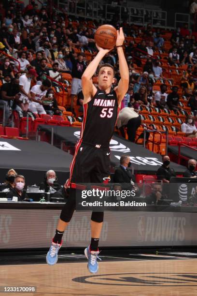 Duncan Robinson of the Miami Heat shoots a three point basket against the Milwaukee Bucks during Round 1, Game 4 of the 2021 NBA Playoffs on May 29,...