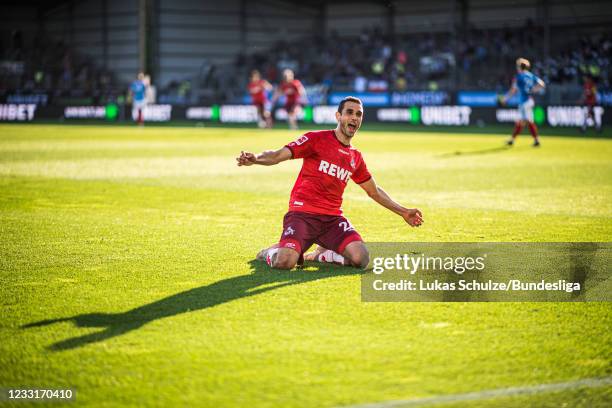 Ellyes Skhiri of Köln celebrates his teams fifth goal during the Bundesliga playoff leg two match between Holstein Kiel and 1. FC Köln at...