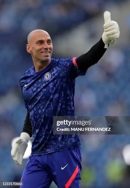 Chelsea's Argentine goalkeeper Willy Caballero gestures as he warms up ahead of the UEFA Champions League final football match between Manchester...