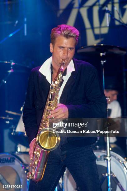 Steve Norman of Spandau Ballet, performing on stage circa March 1989.