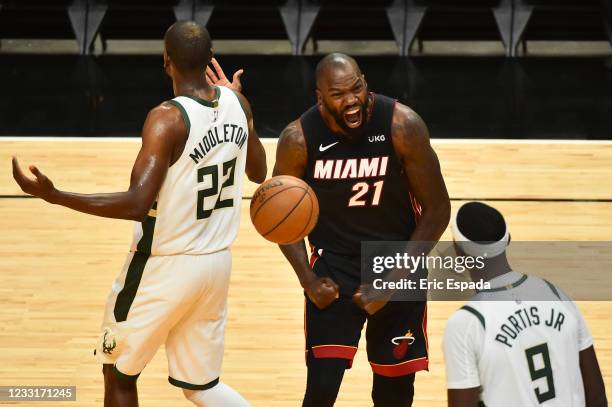 Dewayne Dedmon of the Miami Heat celebrates after a basket during the first half against the Milwaukee Bucks in Game Four of the Eastern Conference...