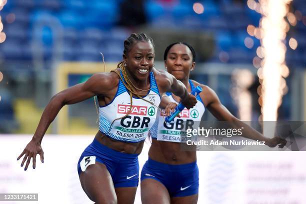Bianca Williams hands the baton to Desiree Henry both of Great Britain as they compete in Women's Relay 4x100 meters during the European Athletics...