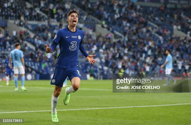 Chelsea's German midfielder Kai Havertz celebrates after scoring his team's first goal during the UEFA Champions League final football match between...