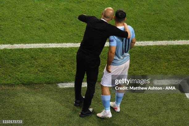 Pep Guardiola the manager / head coach of Manchester City gives instructions Sergio Aguero of Manchester City during the UEFA Champions League Final...