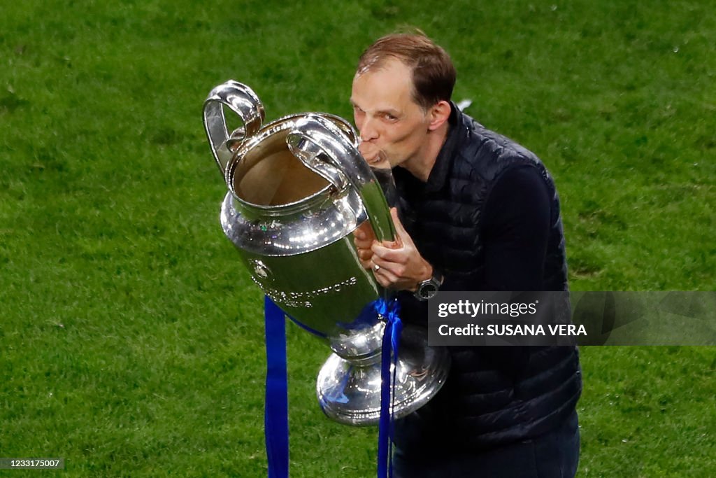TOPSHOT-FBL-EUR-C1-MAN CITY-CHELSEA-TROPHY