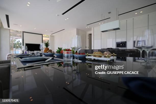 This picture shows the dining room of a luxury villa for sale on one of the Palm Jumeirah man-made island, on the coast of the Gulf emirate of Dubai,...