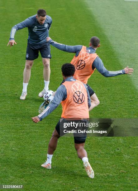 Christian Guenter of Germany, Robin Gosens of Germany and Serge Gnabry of Germany battle for the ball during Day 2 of the Germany Seefeld Training...