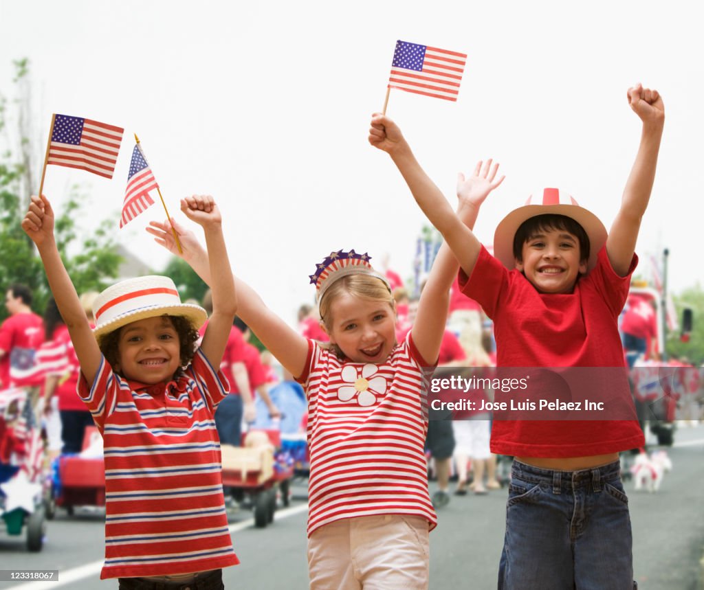 Friends cheering at fourth of July celebration