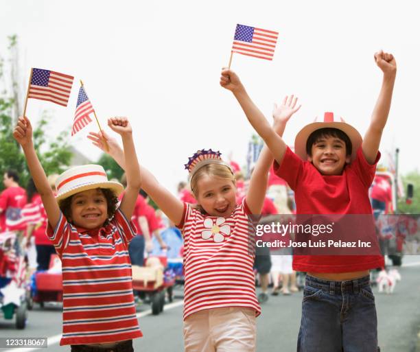 friends cheering at fourth of july celebration - american flag small stock pictures, royalty-free photos & images